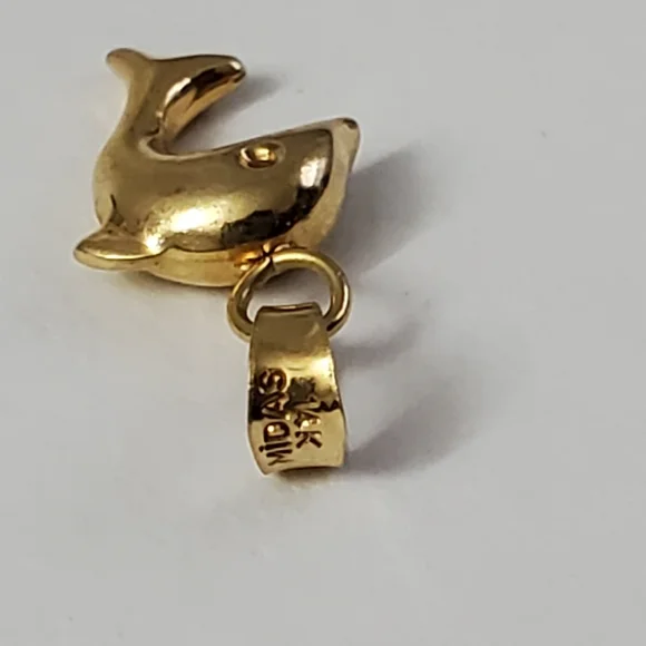 14K Gold Dolphin Pendant – A Playful Symbol of Grace and Freedom